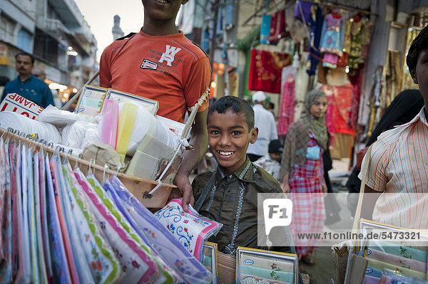 Young merchants near the Charminar monument  Hyderabad  Andhra Pradesh  southern India  India  Asia