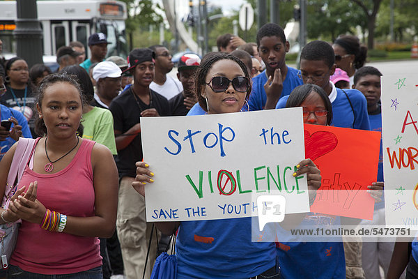 Detroit youth  mostly high school students  march through downtown streets to urge their elected leaders to take action against gun violence in their community  Detroit  Michigan  USA