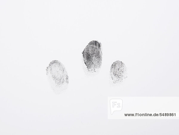 Black fingerprints on white background