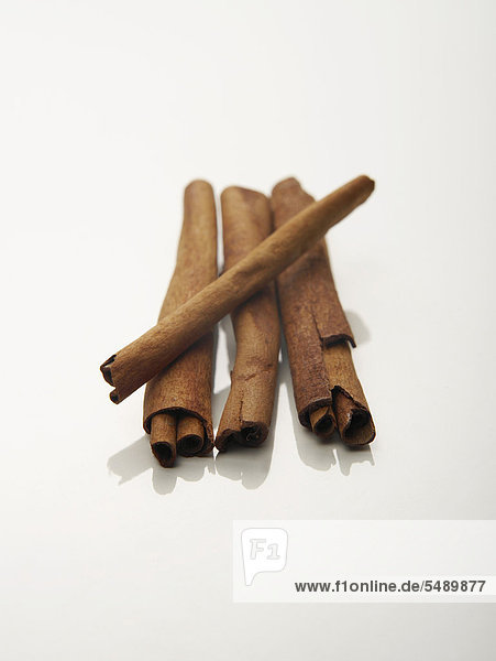 Cinnamon bark on white background  close up