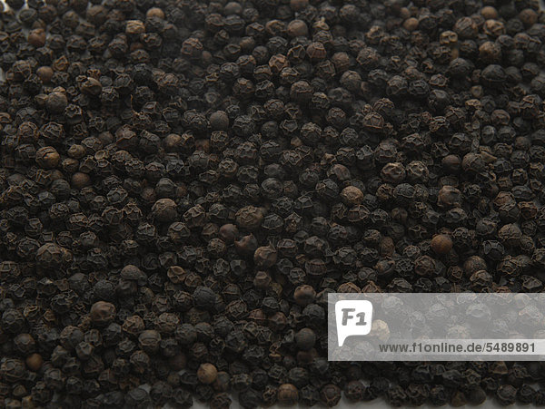 Full frame of black peppercorn