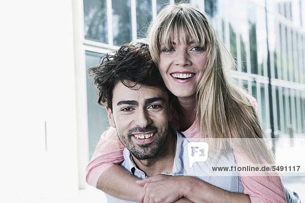 Germany  Cologne  Young couple smiling  portrait