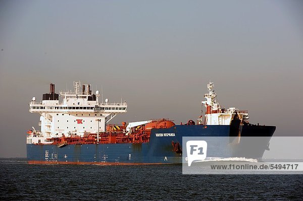 Oil-tanker on the north-sea entering the Rotterdam harbor to unload his cargo.