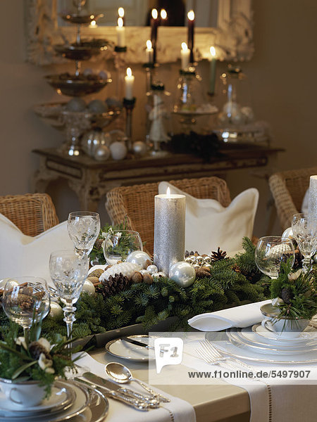 Christmas dining table arranged to create a festive atmosphere