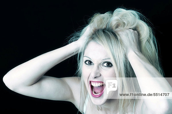 Screaming young woman  funny portrait
