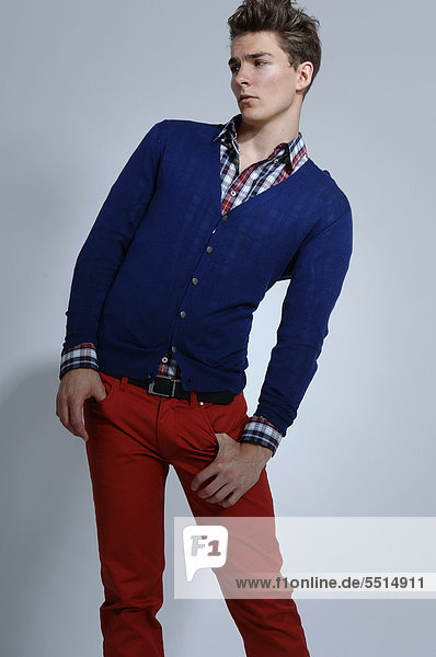 Fashion photo of a young man in colourful casual clothing