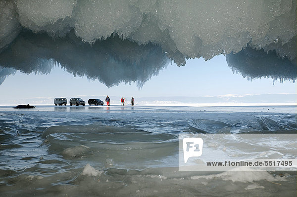 Cars and people on frozen Lake Baikal  island Olkhon  Lake Baikal  Siberia  Russia  Eurasia