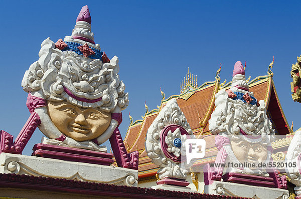 Gesichterreliefs im buddhistischen Tempel an der Dongpalan Straße  Vientiane  Laos  Indochina  Asien