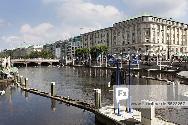 Commercial buildings on the corner of the Town Hall Market square and Jungfernstieg in Hamburg with the small Alster Lake  Hamburg  Germany  Europe