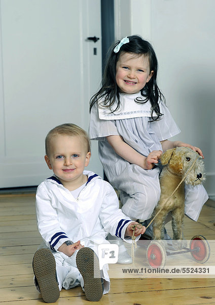 Siblings  boy  2  and girl  5  wearing sailor outfits