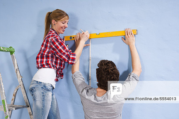 Young couple renovating