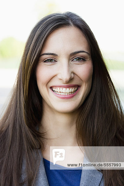 Close up of businesswomans smiling face