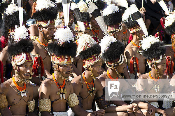 Warriors of the Khiamniungan tribe waiting to perform ritual dances at the Hornbill Festival  Kohima  Nagaland  India  Asia