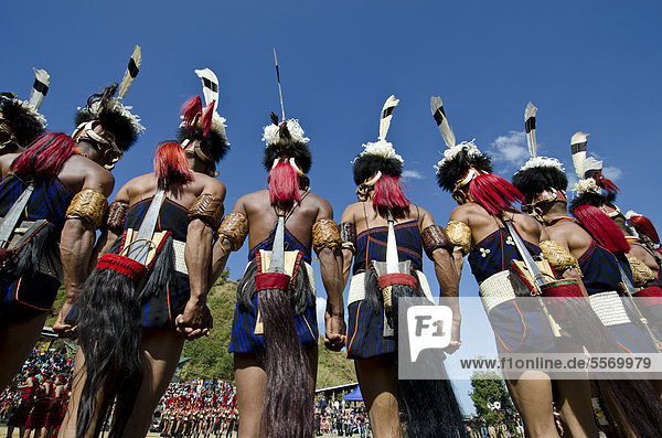 Warriors of the Khiamniungan tribe performing ritual dances at the Hornbill Festival  Kohima  Nagaland  India  Asia