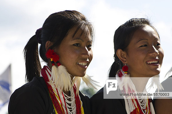 Young women of the Konyak tribe waiting to perform ritual dances at the Hornbill Festival  Kohima  Nagaland  India  Asia