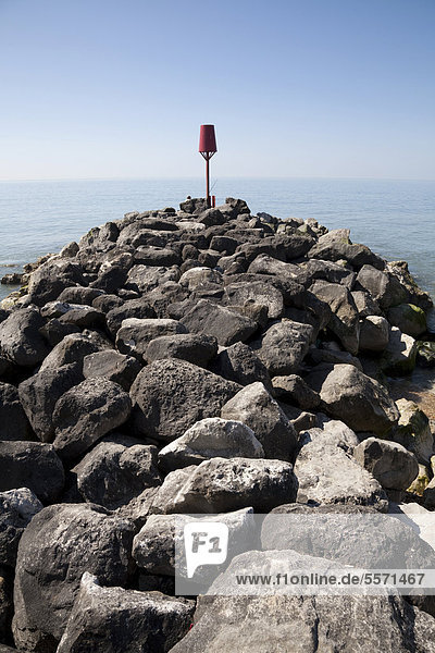 Rock stone groynes sea defences at Barton on Sea  Hampshire  England  United Kingdom  Europe