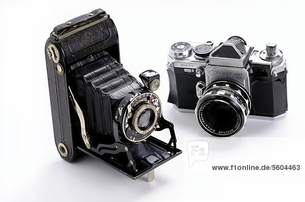 Old roll-film camera and old Edixa mat single-lens reflex camera