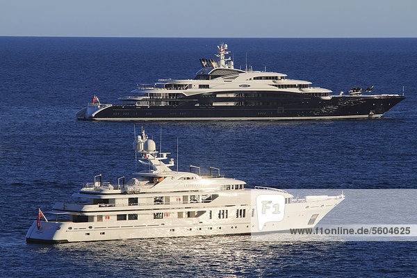 'Motoryacht ''Serene''  133.9m  built in 2011 by yacht builder Fincantieri Yachts and owned by Yuri Scheffler  and motoryacht ''Candyscape II'' on the CÙte d'Azur  Monaco  Mediterranean  Europe'