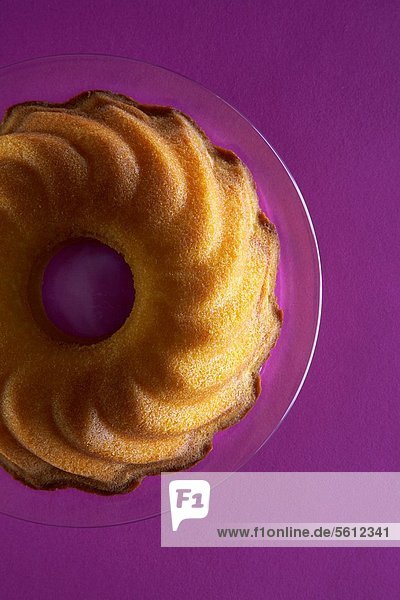 Ring-shaped cake on glass plate