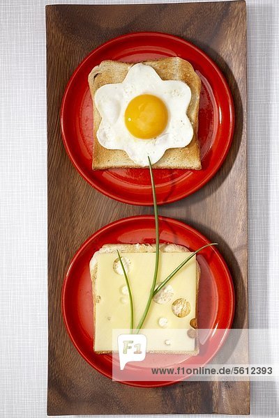 Toasts with cheese and fried egg