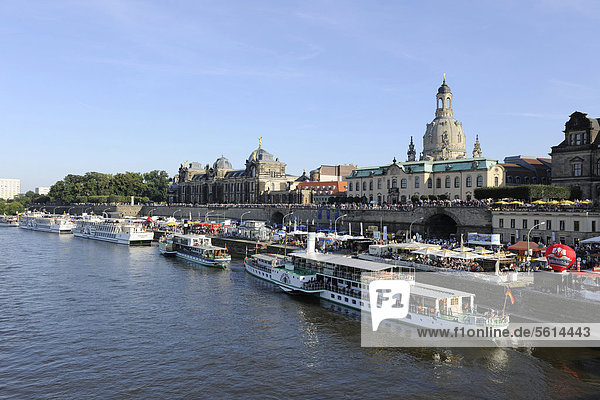 Dresden City Festival  Terrassenufer waterfront and Bruehl's Terrace  Elbe River and boats  Frauenkirche church at the back  Saxony  Germany  Europe