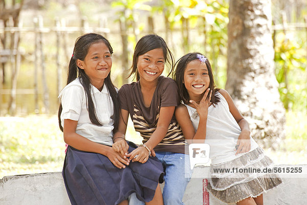 Happy girls at a school in Port Barton  Palawan Island  Philippines  Asia