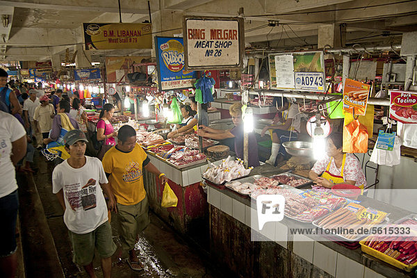 Stalls  butchers with their meat on the market in the capital  Puerto Princesa  Palawan Island  Philippines  Asia