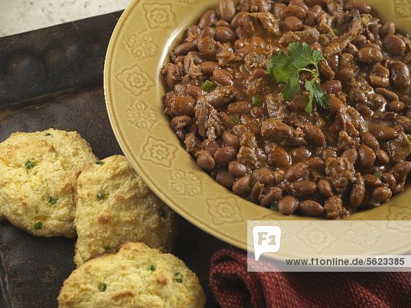 Brisket Baked Beans with Green Chili Cornbread Biscuits