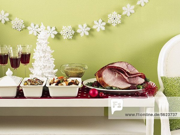 Christmas buffet table with roast ham  vegetables and rice