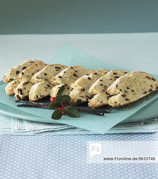 Sliced Stollen on a blue and white polka dotted serviette