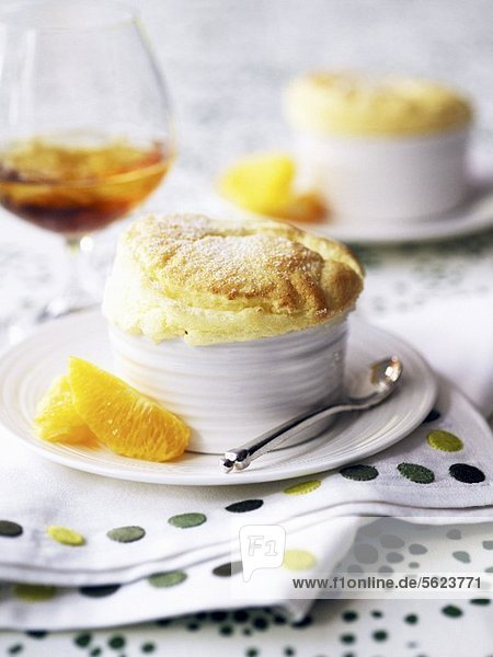 Orange souffle garnished with fresh oranges