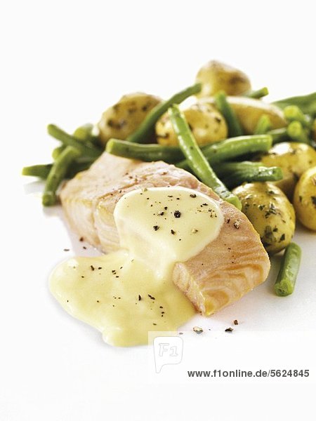 Salmon fillet with Hollandaise sauce  potatoes and green beans