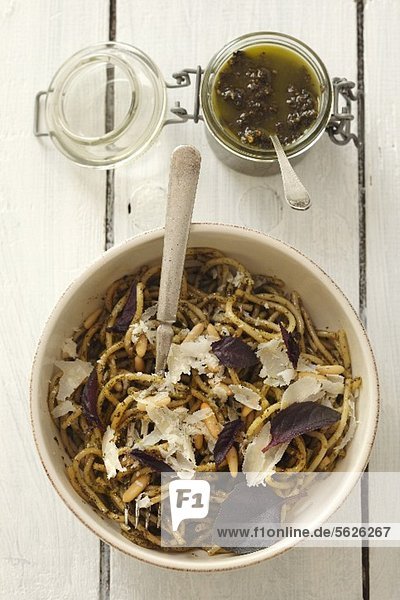 Spaghetti with purple basil pesto and Parmesan cheese