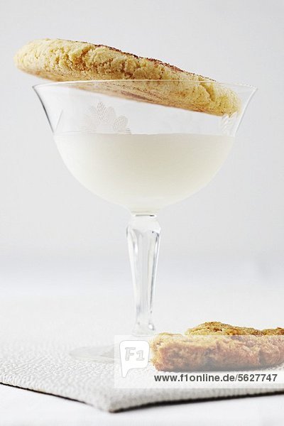 Milk in a Stem Glass with Snickerdoodles