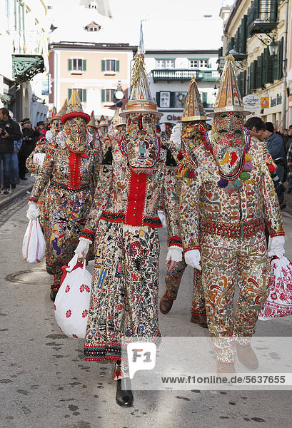People wearing Flinserl costumes  spring figures of the Ausseer carnival  Carnival in Bad Aussee  Ausseerland  Salzkammergut  Styria  Austria  Europe  PublicGround