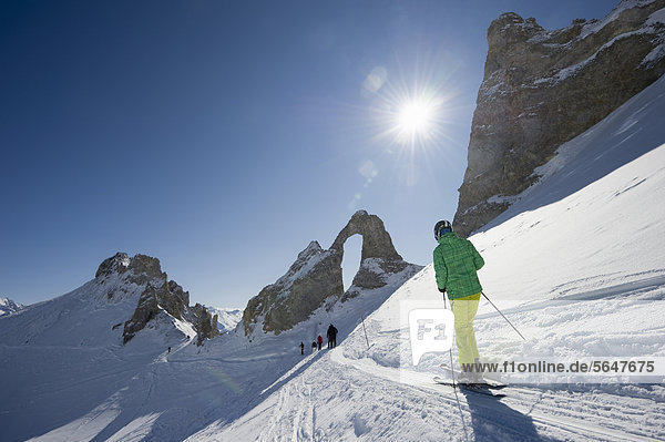 Cross-country skiers in the snow-covered mountain landscape  Aiguille Percee  Tignes  Val d'Isere  Savoie  Alps  France  Europe