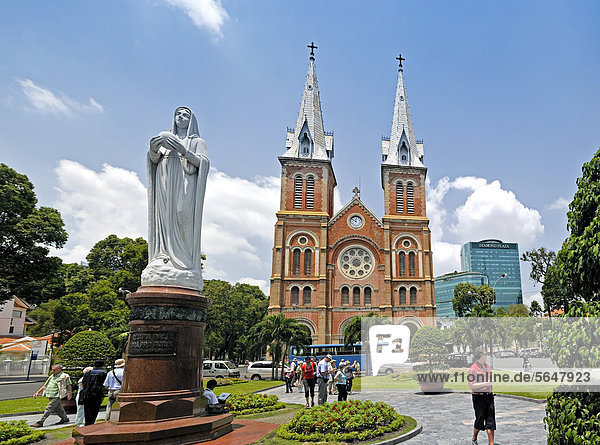 Catholic Cathedral of Notre Dame  Nha Tho Duc Ba  Church of Our Lady  with a statue of Mary  with Diamond Plaza shopping centre at the rear  Saigon  Ho Chi Minh City  Vietnam  Southeast Asia  Asia