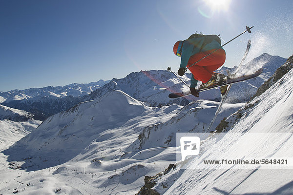 Austria  Tirol  Ischgl  Man ski jumping in snow