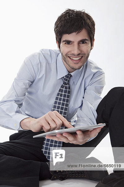 Geschäftsmann mit Tablet PC  Portrait