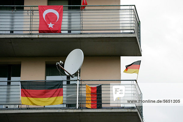 Turkish and German flags on balconies  Kreuzberg  Berlin  Germany