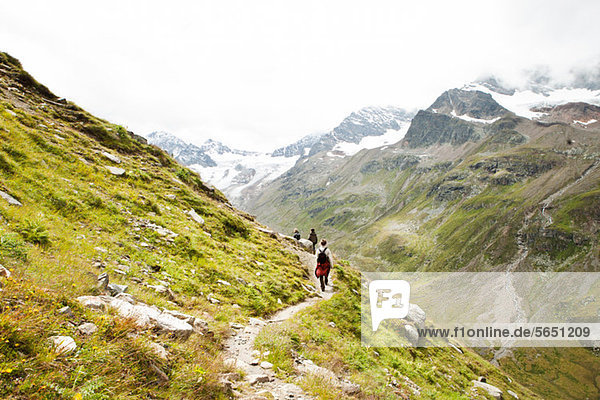 Family hiking in Alps  Tirol  Austria