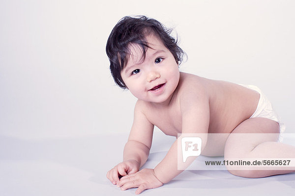 Baby girl crawling  portrait