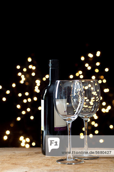 Bottle of red wine and two glasses