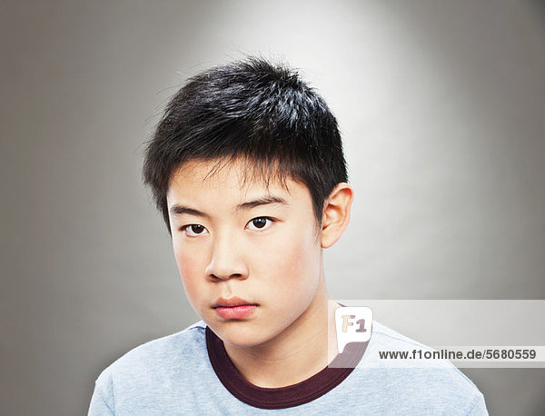 Portrait of young Asian teenage boy