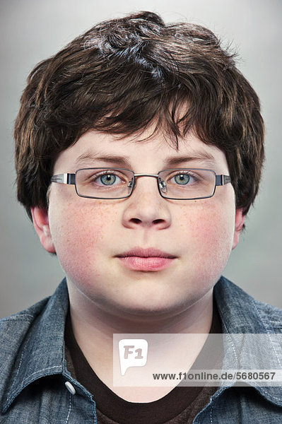 Portrait of young teenage boy wearing spectacles