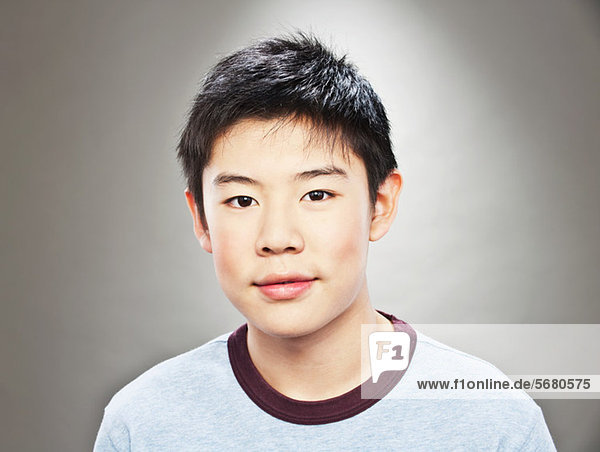 Portrait of young Asian teenage boy