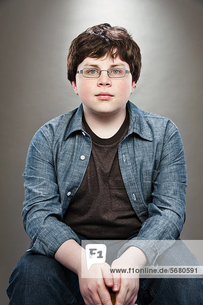 Portrait of young teenage boy wearing spectacles