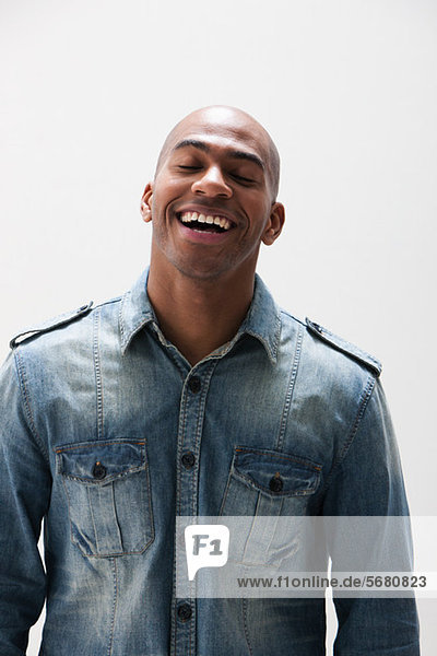 African American man smiling  studio shot