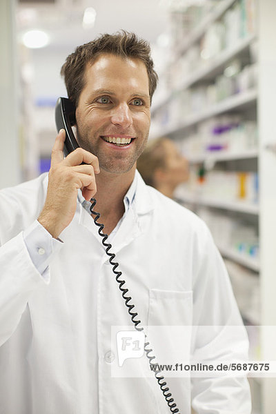 Pharmacist talking on phone