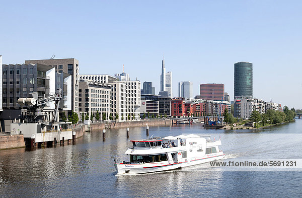 Office and residential buildings  Westhafen district  skyline  cruise vessel on the Main river  Frankfurt am Main  Hesse  Germany  Europe  PublicGround